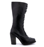 Ariana by Oak Tree Farms is a women's black leather boot with a lace detail on a white background.