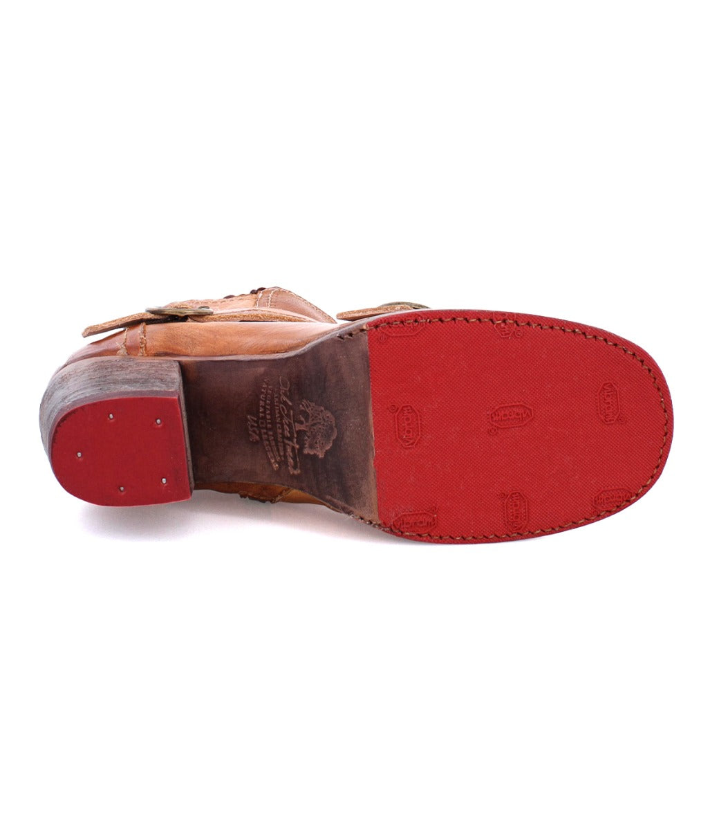 A pair of Bady shoes with Oak Tree Farms red soles on a white background.