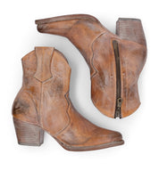 A pair of Baila cowboy boots by Oak Tree Farms on a white background.
