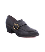A Dyba's black leather loafer with a gold buckle from Oak Tree Farms.