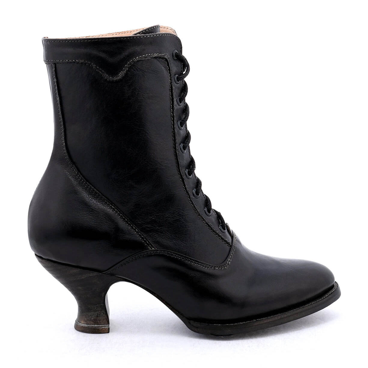 An Eleanor women's black ankle boot with a Victorian style and wooden heel, made by Oak Tree Farms.