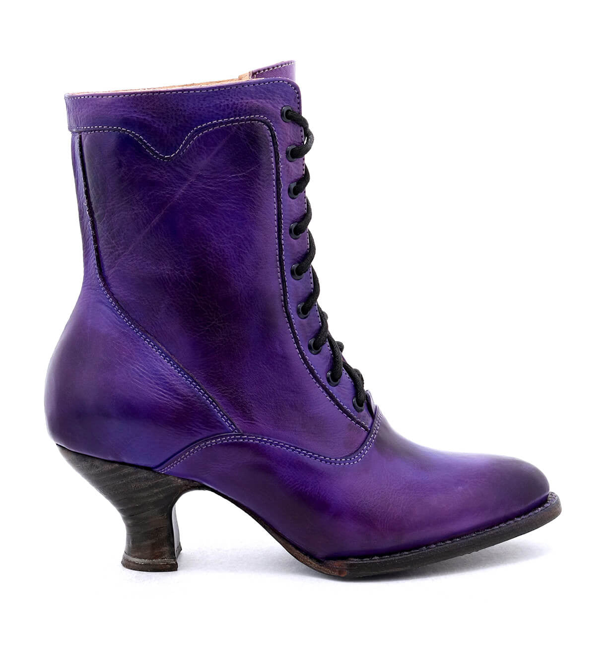 A Victorian style women's purple leather ankle boot, crafted with uncompromising quality and hand-dyed, called the Eleanor by Oak Tree Farms.