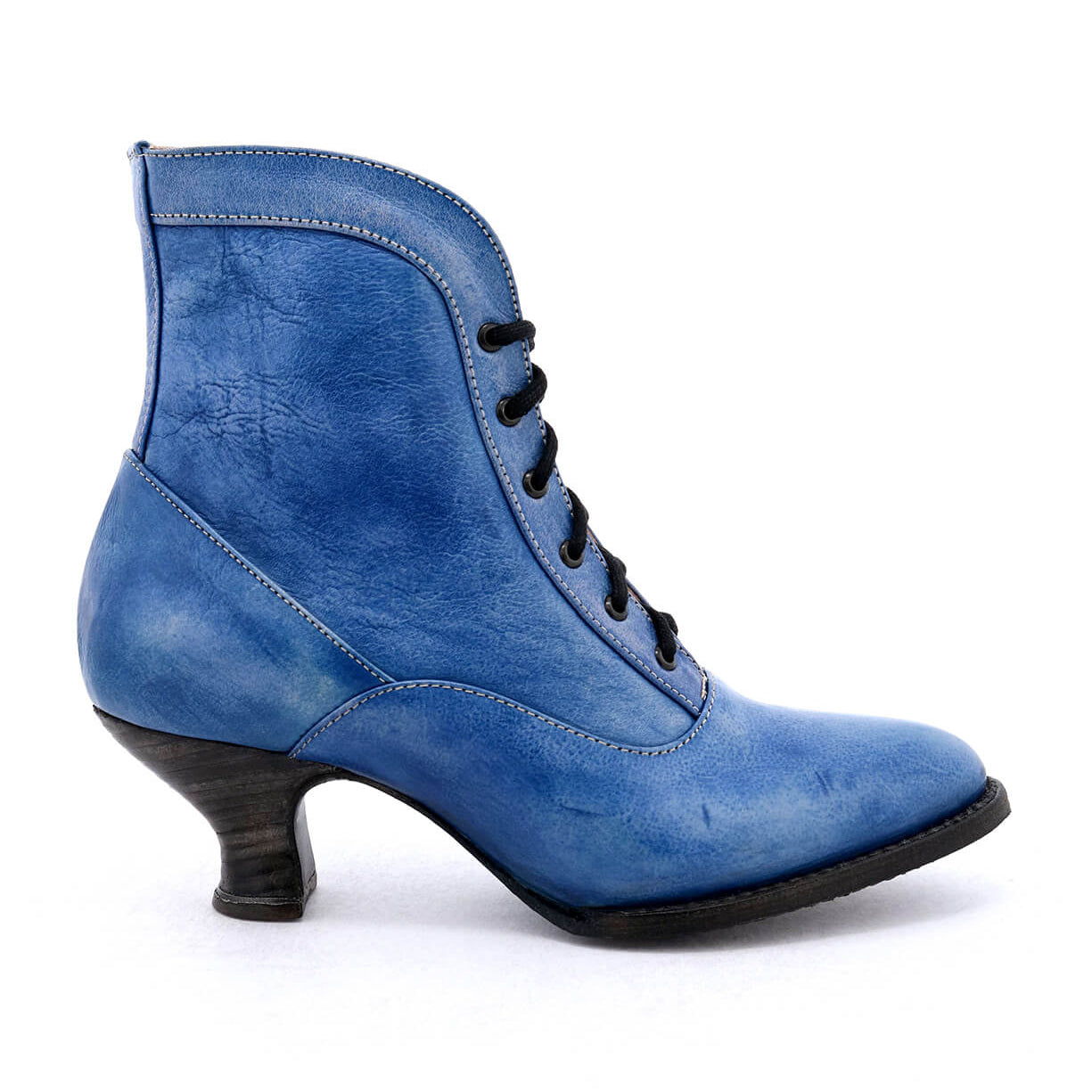 An Oak Tree Farms Jacquelyn handcrafted women's blue leather ankle boot with a leather welted outsole, on a white background.