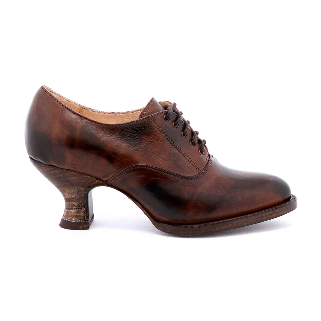 A women's brown oxford shoe with a lace-up front, showcasing a neutral look on a white background - the Oak Tree Farms Janet women's brown oxford shoe, with a lace-up front, showcases a neutral look on a white background.