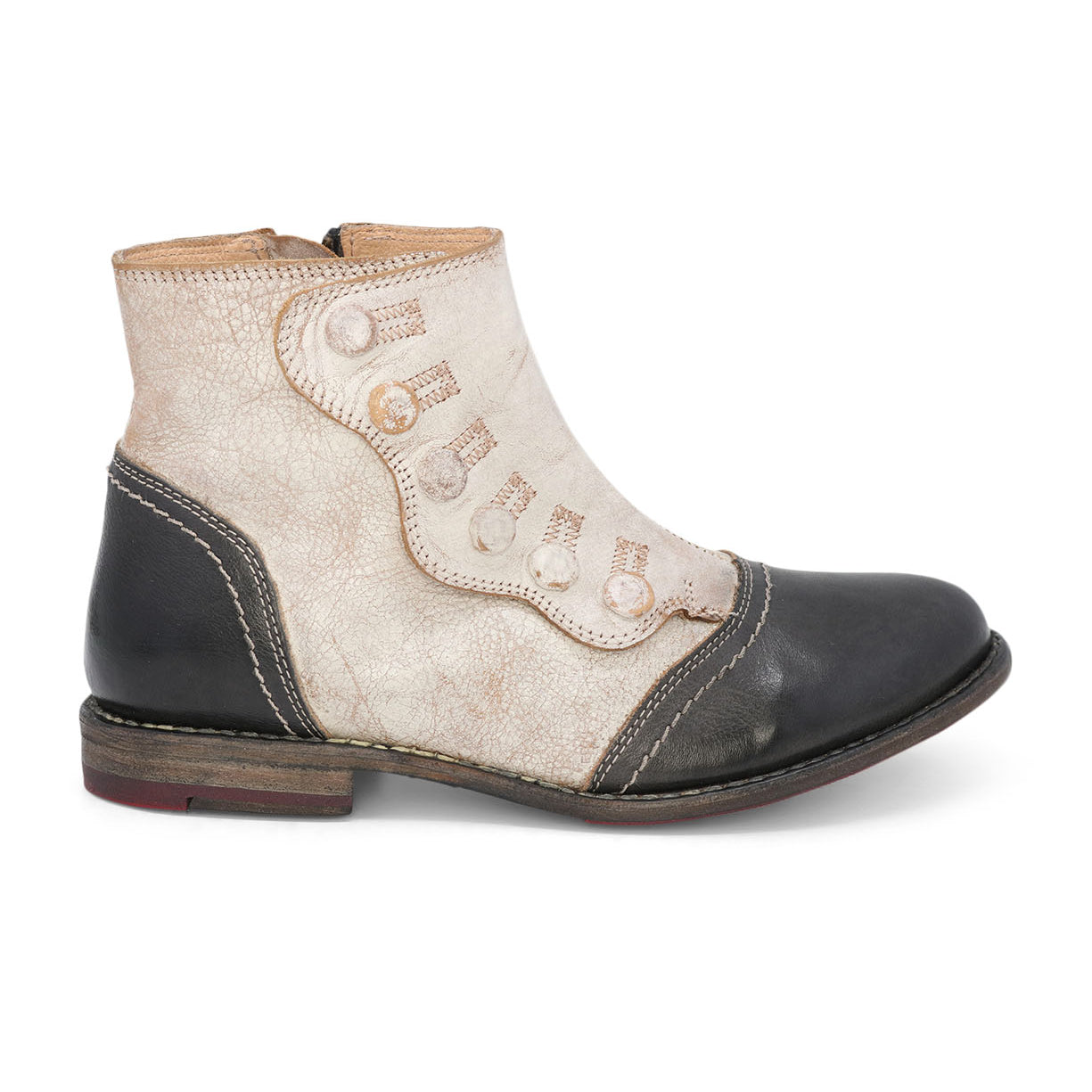 A black and white women's Josephine ankle boot with leather detailing by Oak Tree Farms.