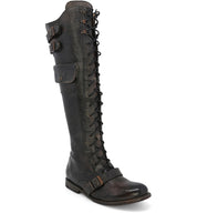 A women's black Meryl boot with buckles, made from vegetable tanned leather and featuring laces, by Oak Tree Farms.