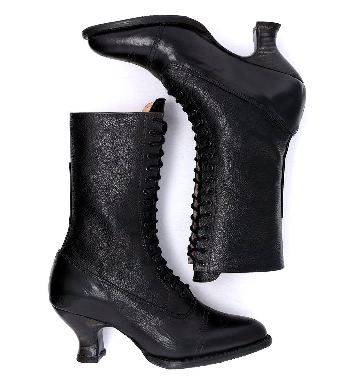 Oak Tree Farms Mirabelle, a pair of black leather boots on a white background.