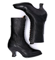 Oak Tree Farms Mirabelle, a pair of black leather boots on a white background.