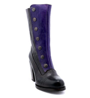 A two-tone colored pair of Amelia boots made with full grain leather and adorned with buttons.