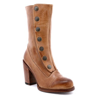 An Amelia ankle boot for women with buttons, crafted with full grain leather and featuring a Goodyear leather welt for durability. Perfect for adding a touch of steampunk flair to any outfit by Oak Tree Farms.
