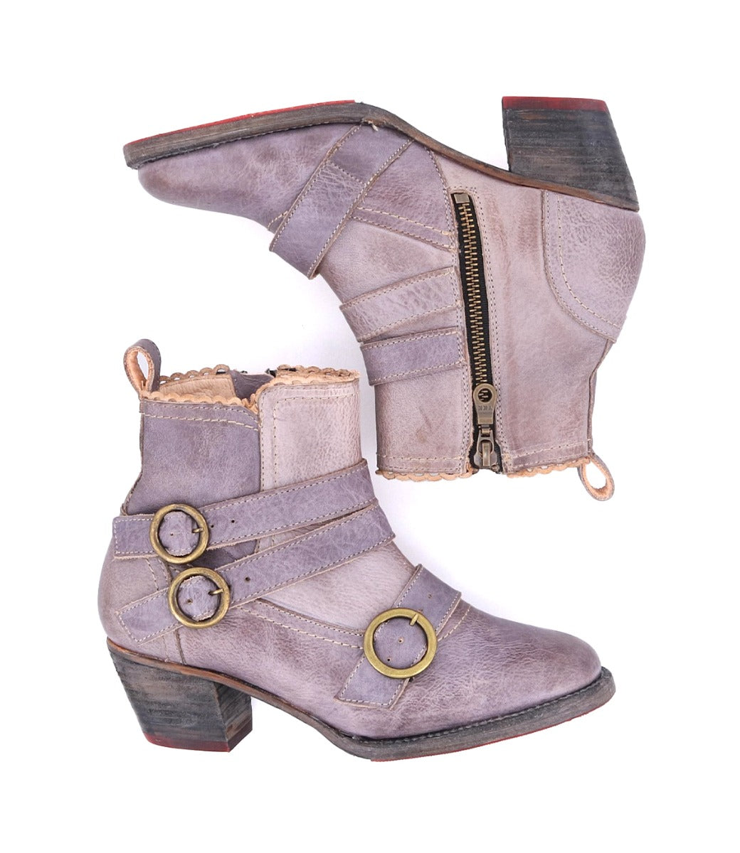 A pair of Bady ankle boots with buckles, made from real leather.