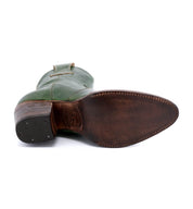 A pair of Baila green leather boots with Oak Tree Farms brown soles.