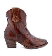 A women's Oak Tree Farms brown Baila cowboy boot with a wooden heel.