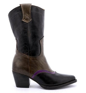 An Oak Tree Farms Basanti women's black and purple leather cowboy boot with a pointed toe on a white background.