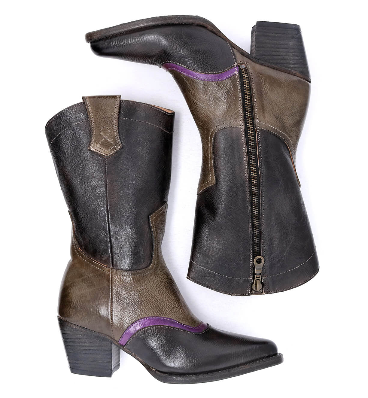 A hand-tooled pair of black and purple Oak Tree Farms Basanti leather cowboy boots.