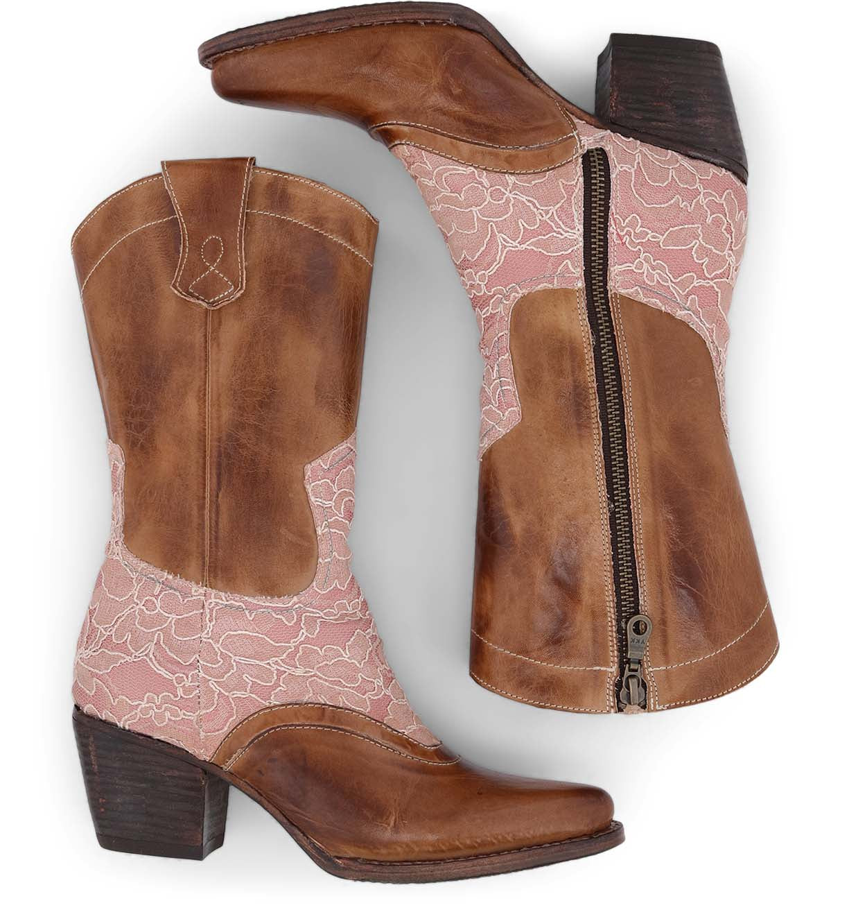 A pair of Oak Tree Farms hand-tooled leather cowboy boots with pink lace, inspired by Basanti.