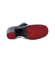 A pair of Oak Tree Farms Dyba shoes with red soles, perfect for the modern Diva.