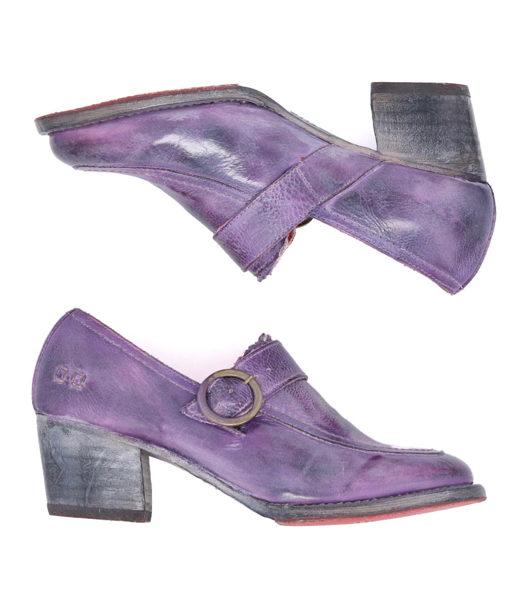 A pair of purple Oak Tree Farms Dyba heeled loafers with metal buckles, fit for a Diva.