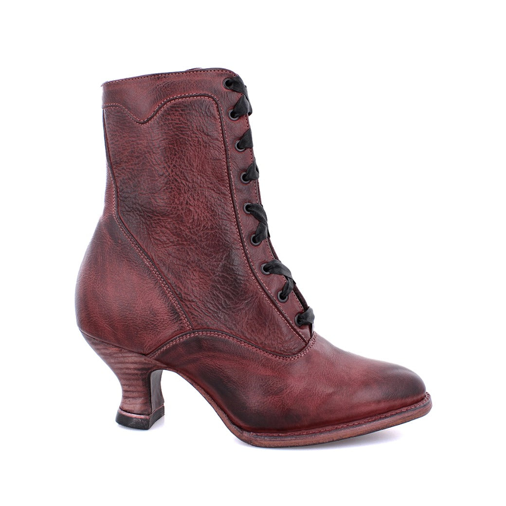 An Eleanor by Oak Tree Farms, women's hand dyed burgundy leather ankle boot, boasting uncompromising quality with a touch of Victorian style.