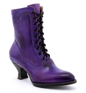 A pair of Eleanor boots by Oak Tree Farms, hand dyed purple leather boots with laces, showcasing Victorian style and uncompromising quality.