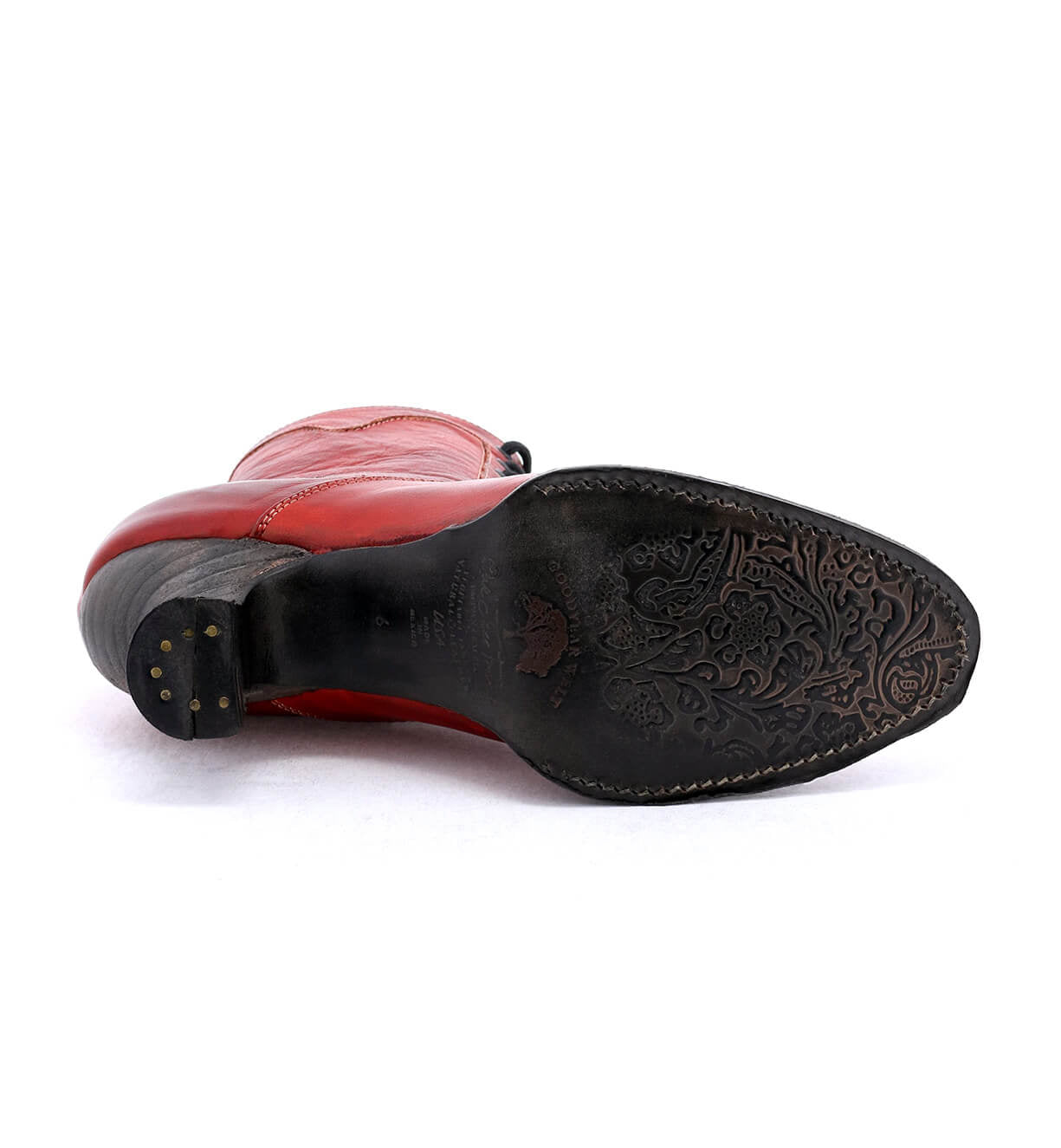 An Eleanor shoe from Oak Tree Farms, a Victorian-style red leather shoe with black detailing, exhibiting uncompromising quality in its hand-dyed craftsmanship.