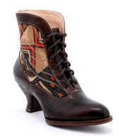 A women's brown boot with a colorful pattern featuring Oak Tree Farms Jacquelyn.
