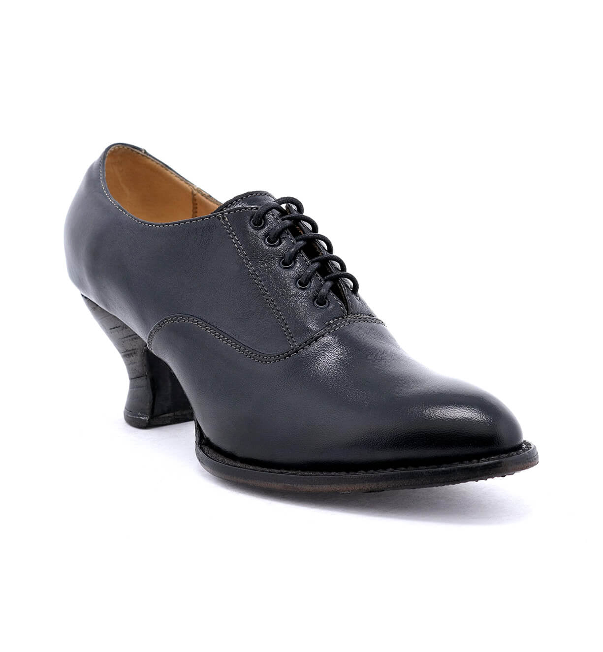 A women's black leather Janet oxford shoe with a spooled heel, lace up, on a white background, by Oak Tree Farms.