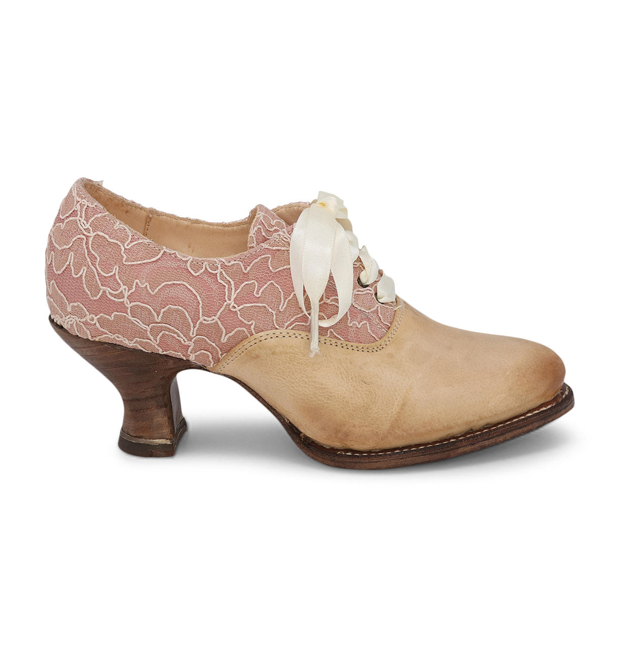 A women's lace-up leather shoe with a pink and white spooled heel, named Janet by Oak Tree Farms.