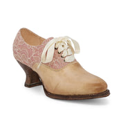A pair of Janet women's shoes with pink lace and a wooden heel made by Oak Tree Farms.
