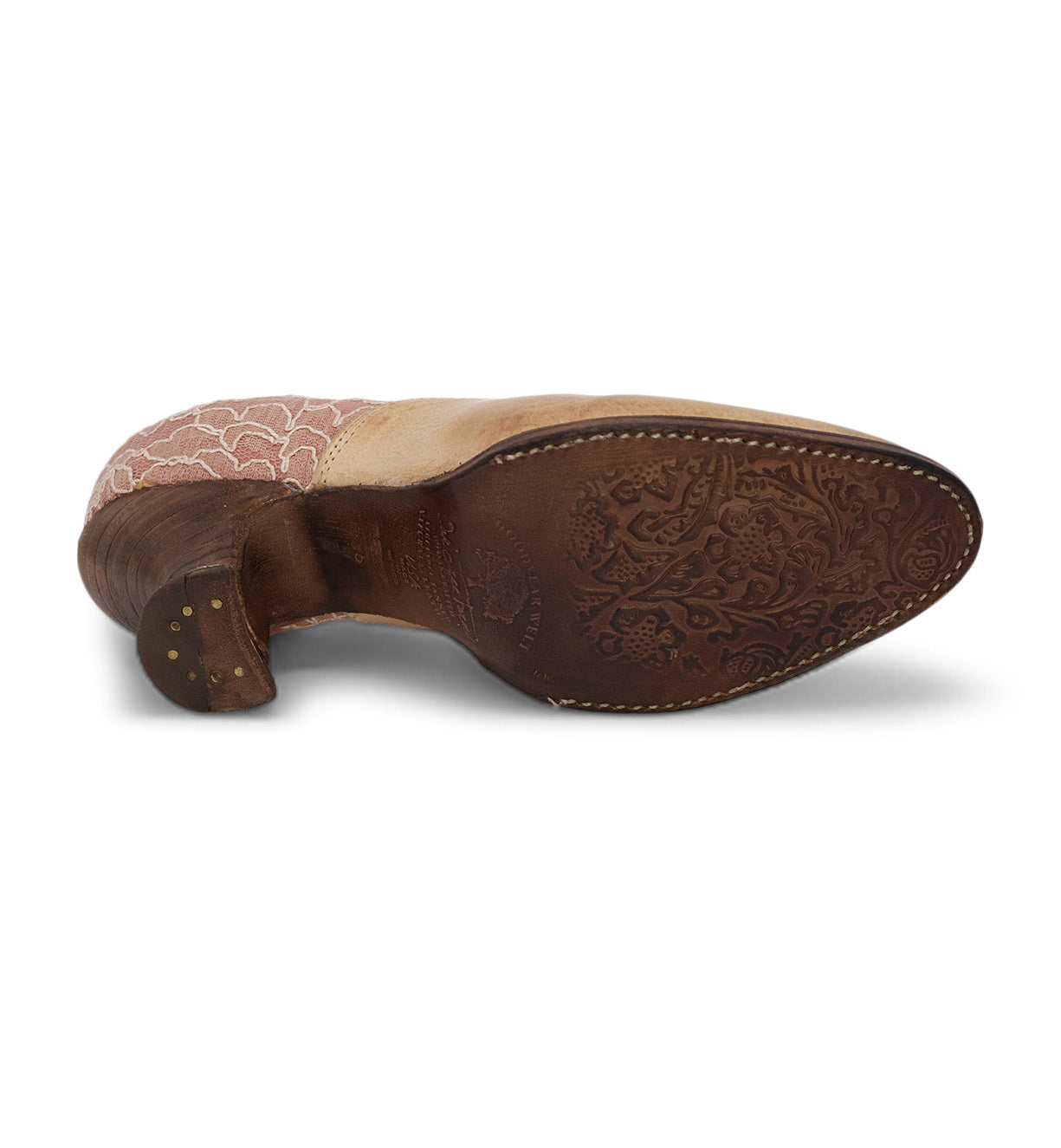 A Janet shoe from Oak Tree Farms with a floral pattern, featuring a lace-up front for a neutral look.