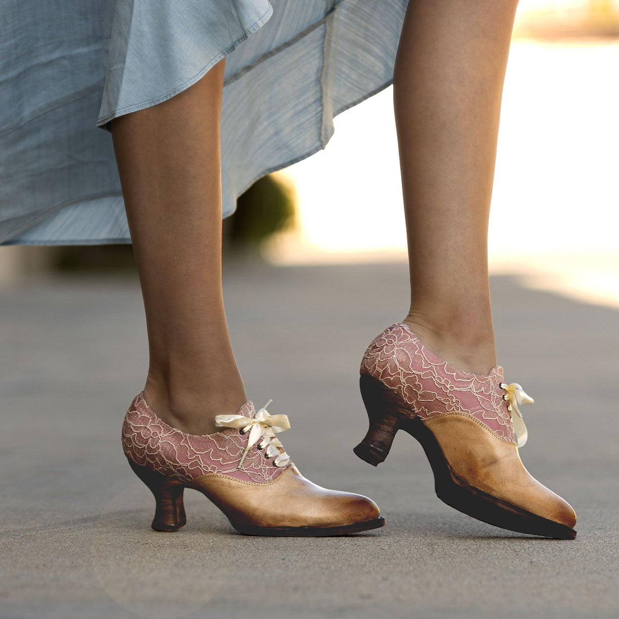 A woman wearing a pair of Janet Oak Tree Farms lace-up front leather shoes with a neutral look.
