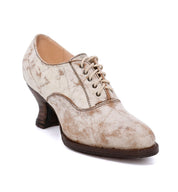 A Janet lace-up front women's beige oxford shoe by Oak Tree Farms on a white background with a neutral look.