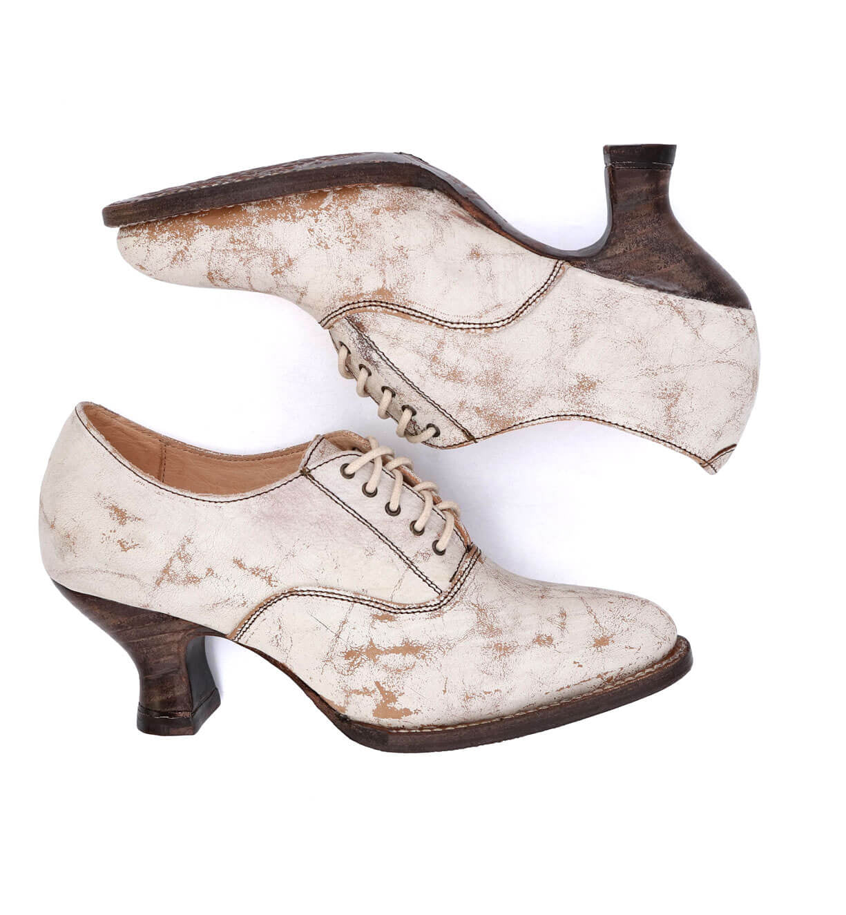 A pair of white Janet oxford shoes with a neutral look on a white background, by Oak Tree Farms.