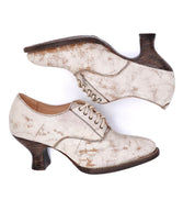 A pair of white Janet oxford shoes with a neutral look on a white background, by Oak Tree Farms.