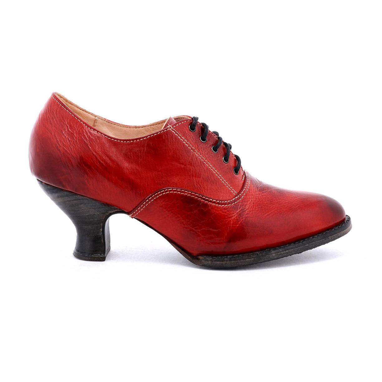 A women's red oxford shoe named Janet, made by Oak Tree Farms, with a lace up front on a white background.