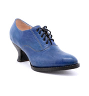 A women's Janet blue oxford shoe by Oak Tree Farms featuring a neutral look on a white background.