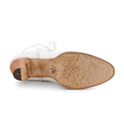 These Jasmine white shoes have an Oak Tree Farms wooden sole.