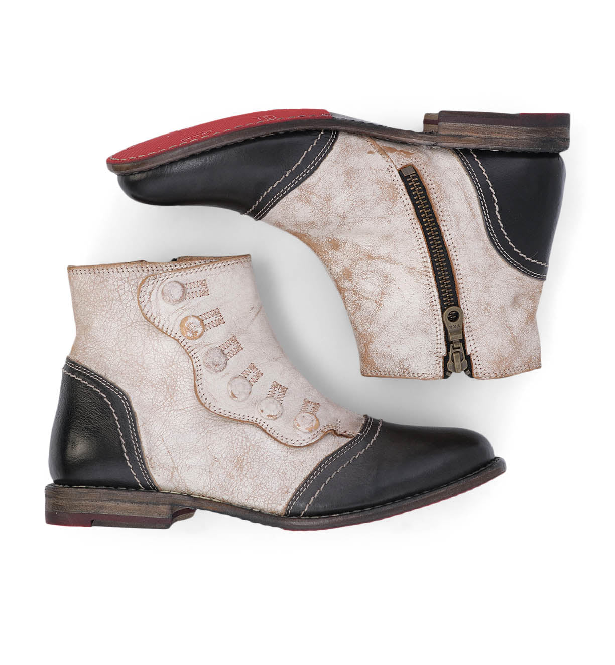 A pair of Oak Tree Farms Josephine women's leather ankle boots with a YKK zipper on the side.