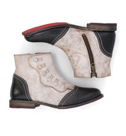 A pair of Oak Tree Farms Josephine women's leather ankle boots with a YKK zipper on the side.