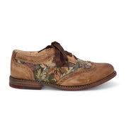 A wardrobe essential, this men's Oak Tree Farms leather wingtip oxford named Maude combines comfort and style with a unique floral print.