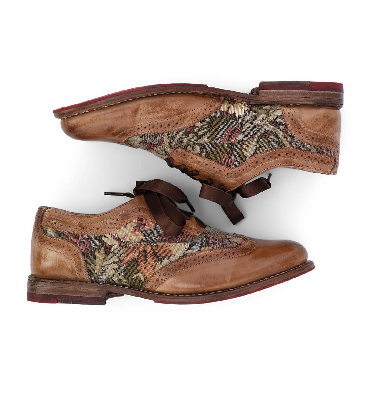 A comfortable pair of Oak Tree Farms men's leather wingtip oxford shoes with a floral pattern, perfect addition to any wardrobe.