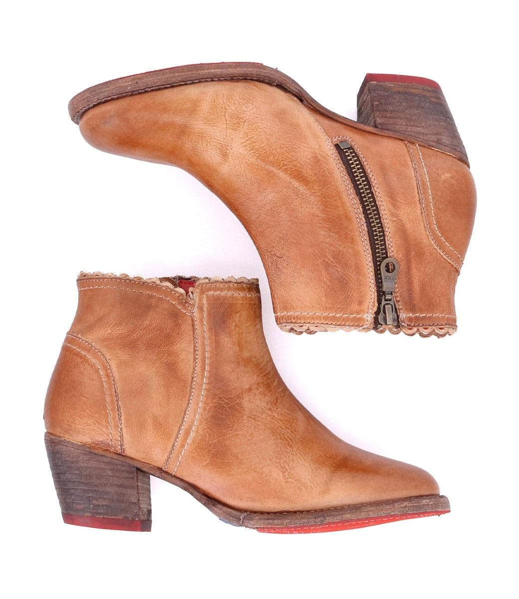 A pair of Mini Oak Tree Farms leather ankle boots.