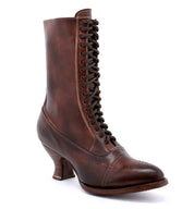 The Oak Tree Farms Mirabelle, a women's brown leather boot, features grommet laces for a stylish touch.