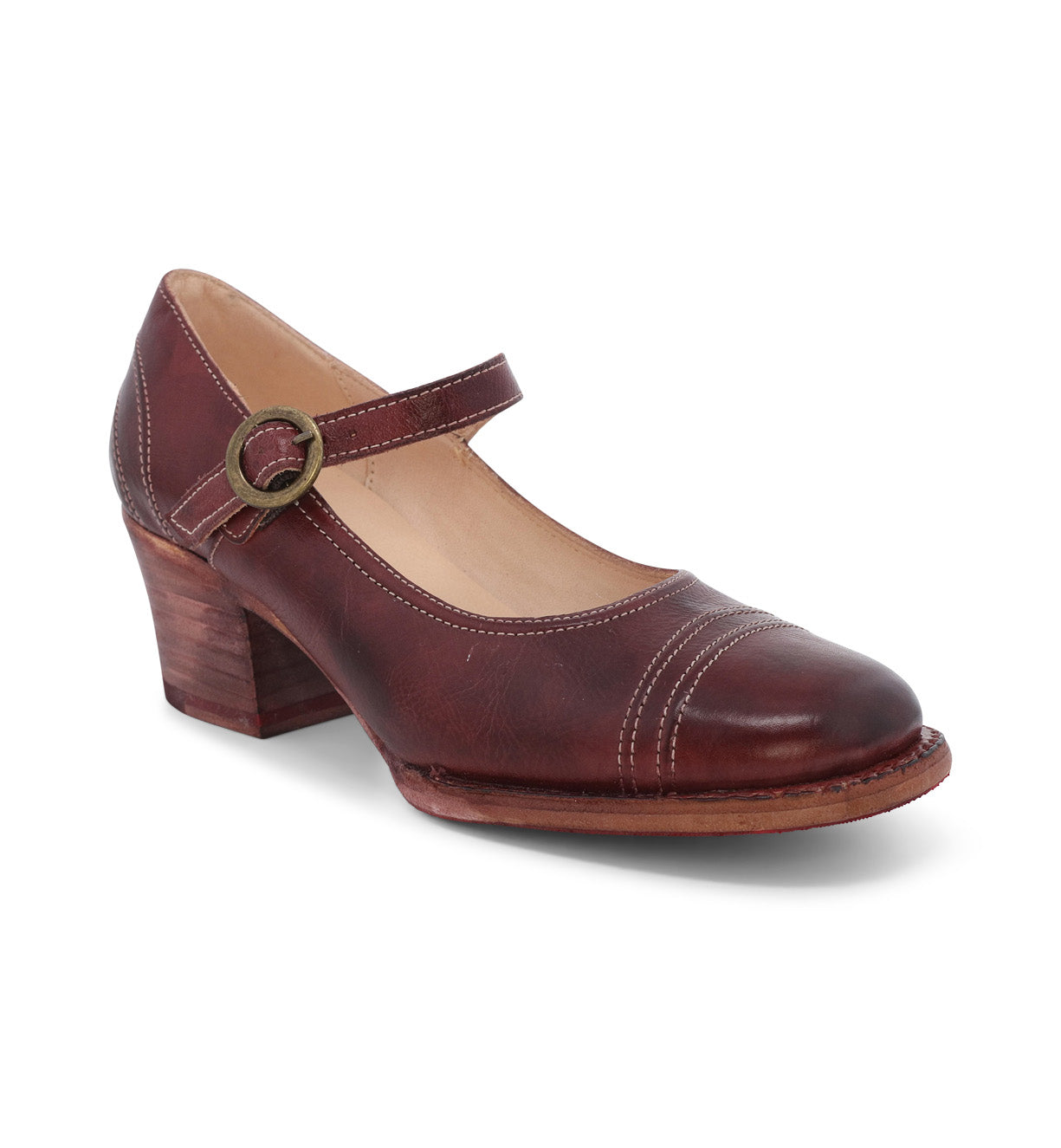 An Oak Tree Farms women's Mary Jane style shoe with a wooden heel, made of leather.
