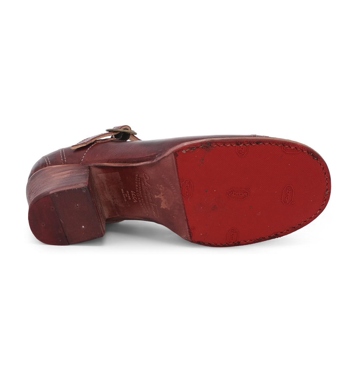 A pair of Oak Tree Farms Twigley style shoes with red soles on a white background.
