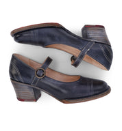 A pair of women's blue mary jane shoes in the Oak Tree Farms Twigley style.