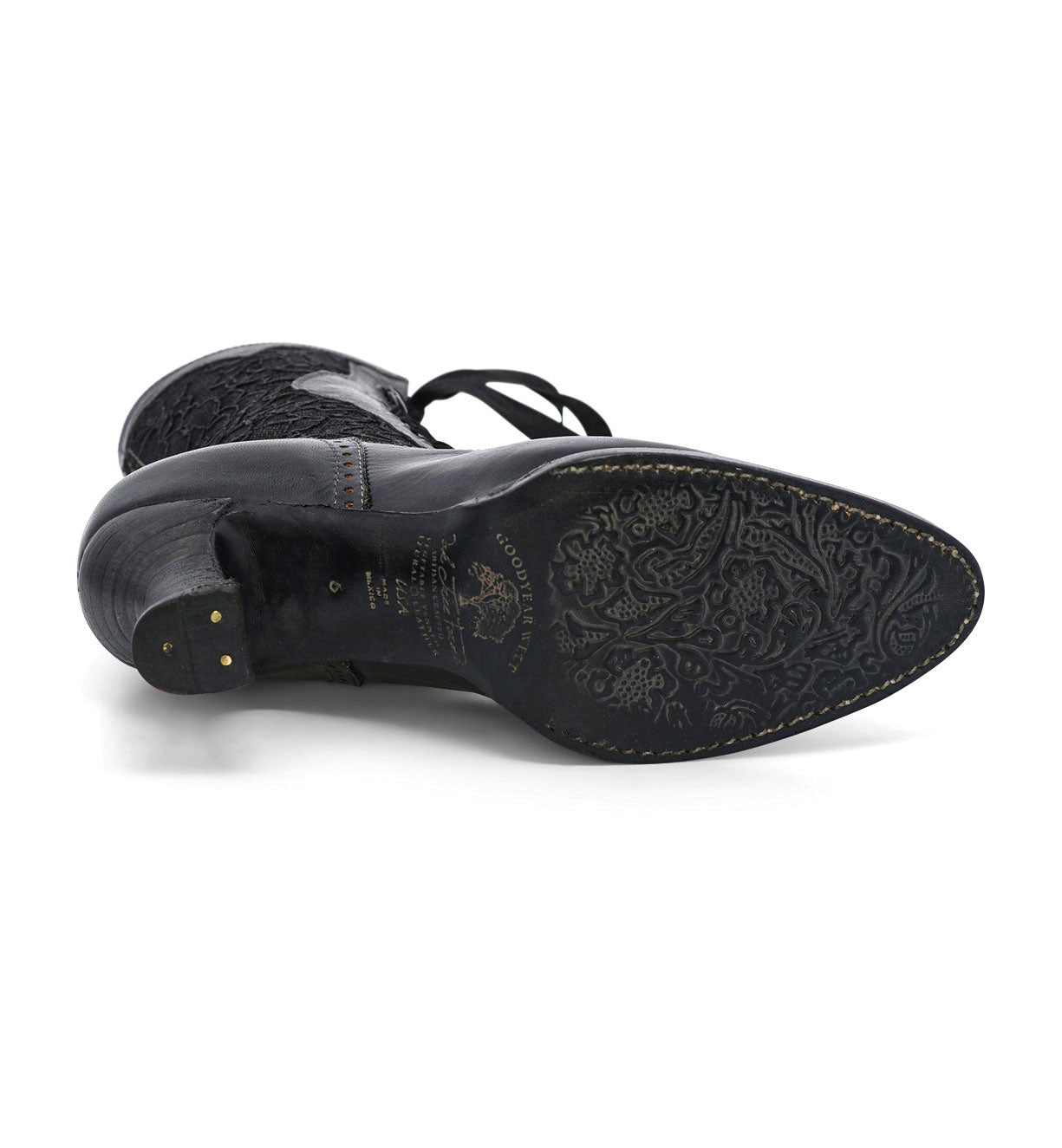 A pair of Oak Tree Farms Abigale hand crafted black lace shoes on a white background.