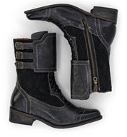 A pair of handcrafted Oak Tree Farms Faye leather riding boots with zippers and buckles.