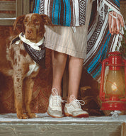 A woman is standing next to a dog, finding comfort in Maude by Oak Tree Farms companionship.